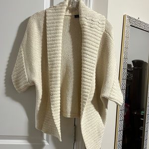 Knitted cream cardigan sweater with wide sleeves